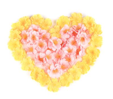 Artificial flowers heart. Isolated on a white background.