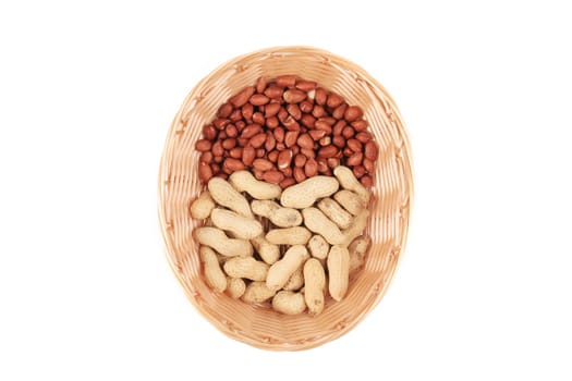 Basket full with peanuts. Isolated on a white background