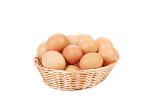 Brown eggs in the basket. isolated on a white background