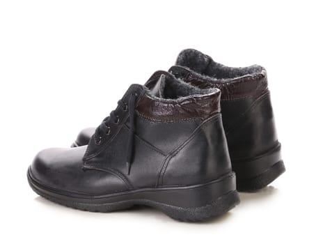Black leather boots. Isolated on a white background.