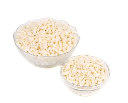 close up of two Bowl with Cottage cheese. Isolated on a white background