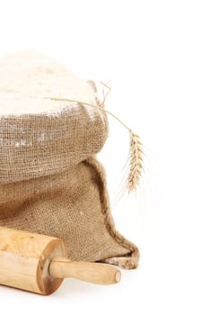 Sack and rolling pin. Isolated on a white background.