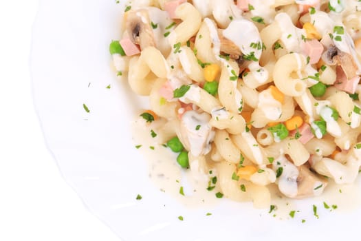 close up of pasta cavatappi with vegetables and sausage on a white plate. isolated on a white background