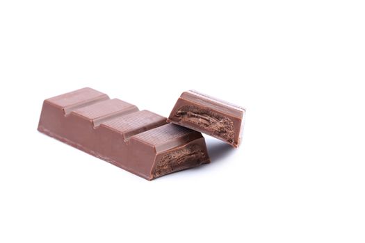 Chocolate bars stack. Isolated on a white background.
