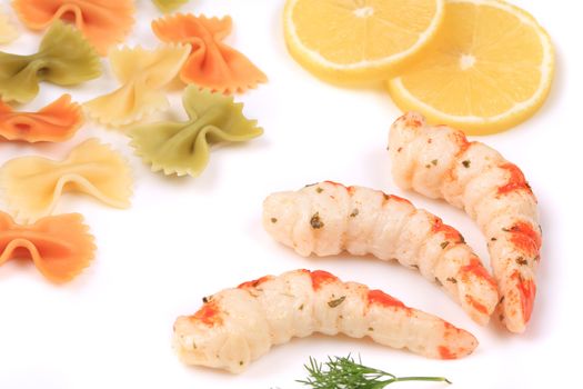 Shrimp with sauce and pasta. Isolated on a white background.