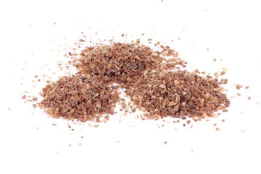 Brown sugar. Isolated on a white background.