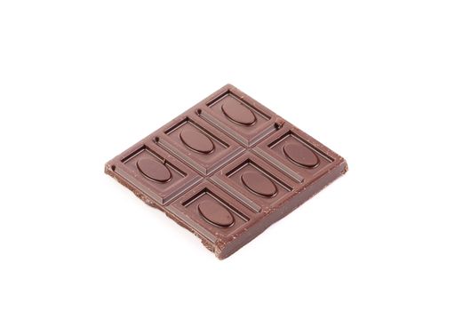 Broken dark chocolate bar. Isolated on a white background.