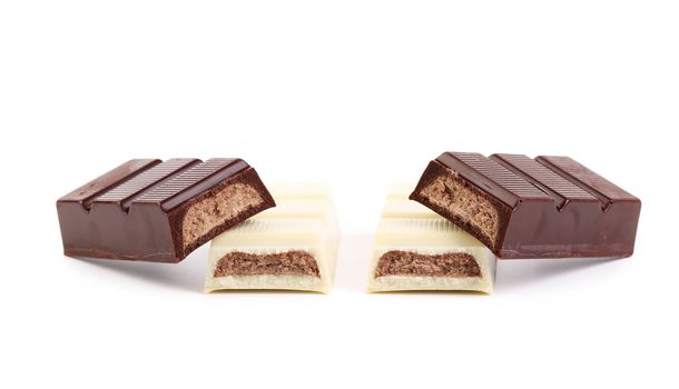 Chocolate bar with sweet creamy filling. Isolated on a white background.