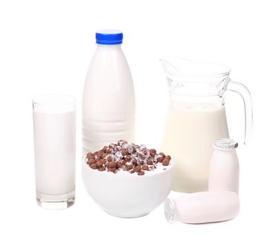 Milk products and bowl with chocolate cereals. Isolated on a white background.