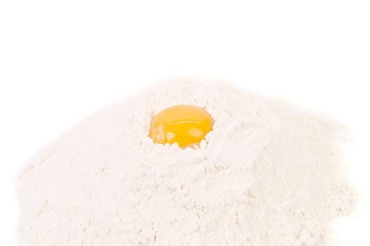 Flour and yolk. Isolated on a white background.