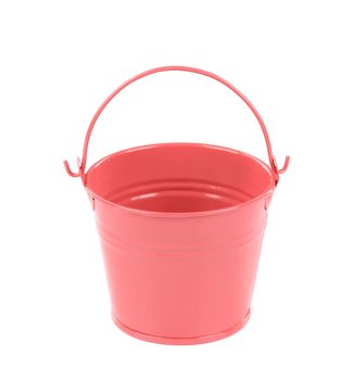 Pink metal bucket with handle. Isolated on a white background.