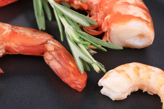 Tasty boiled tiger shrimps with rosemary.