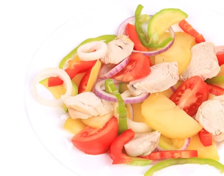 Chicken salad with potatoes. Isolated on a white background.