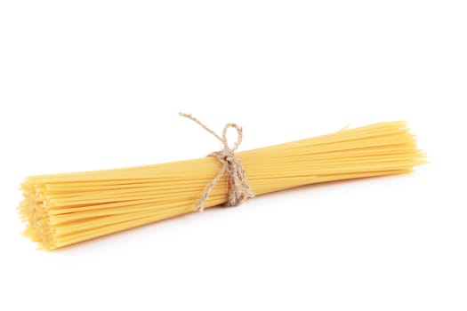 Bunch of uncooked spaghetti. Isolated on a white background.