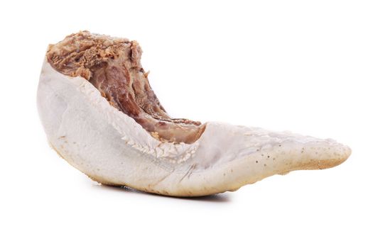 Raw beef tongue. Isolated on a white background.