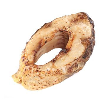 Grilled carp steak. Isolated on a white background.