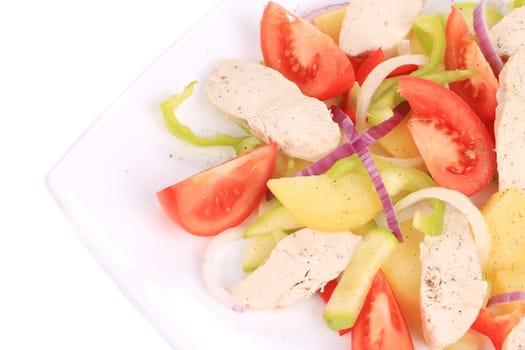 Chicken salad with potatoes. Isolated on a white background.