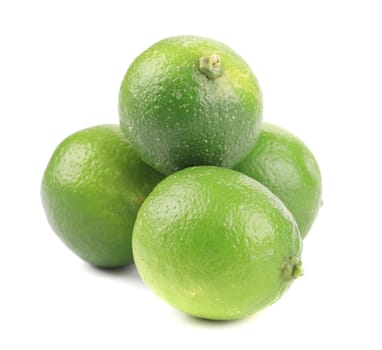 Fresh green limes. Isolated on a white background.