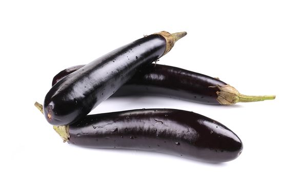 Fresh eggplants. Isolated on a white background.