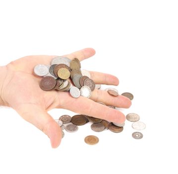 Coins spilled from hand. Isolated on a white background.