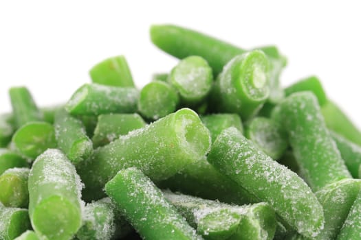 Frozen french beans. Isolated on a white background.