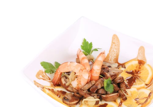 Shrimp salad with mushrooms. Isolated on a white background.