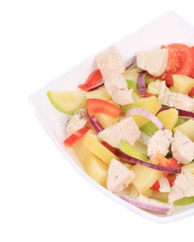 Chicken salad with potatoes. Isolated on a white background.