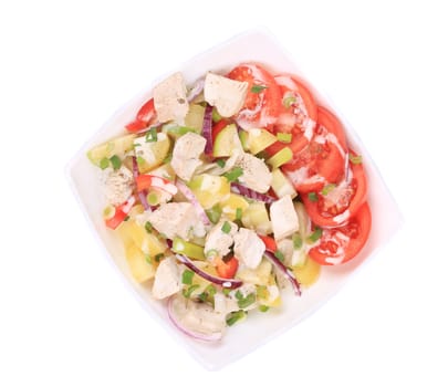 Chicken salad with potatoes. Isolated on a white background.