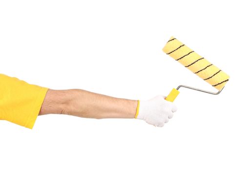 Hand with roller. Isolated on a white background.