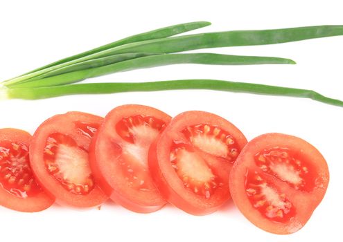 Spring onions and sliced tomatoes. Isolated on a white background.