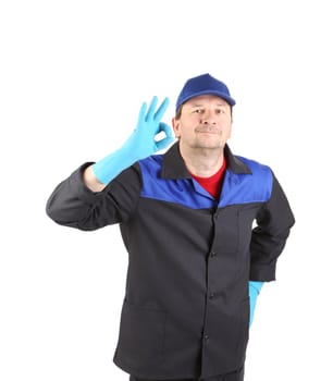 Man in blue gloves show ok sign. Isolated on a white background.