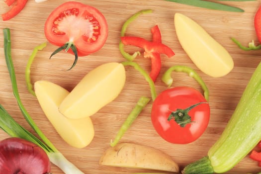 Fresh vegetables on cutting board.