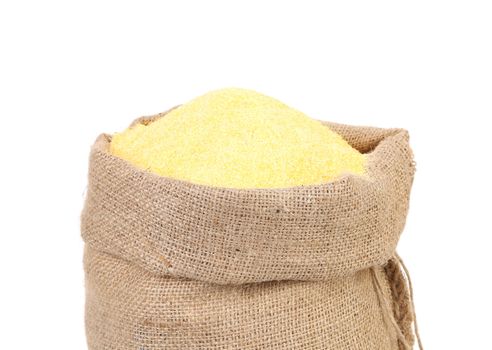 Canvas bag with cornmeal. Isolated on a white background.
