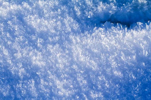 snow cover in the spring on a bright sun