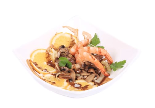 Shrimp salad with mushrooms and lemons. Isolated on a white background.