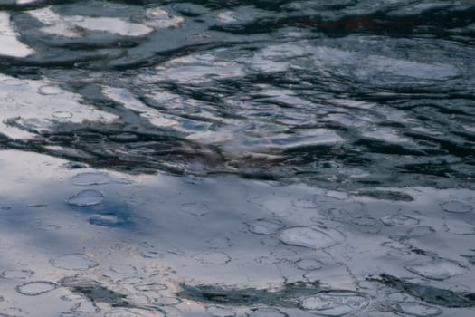 dark muddy sea water in the winter