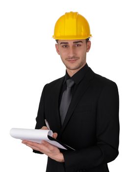Young man wearing a hard hat and holding a clipboard.