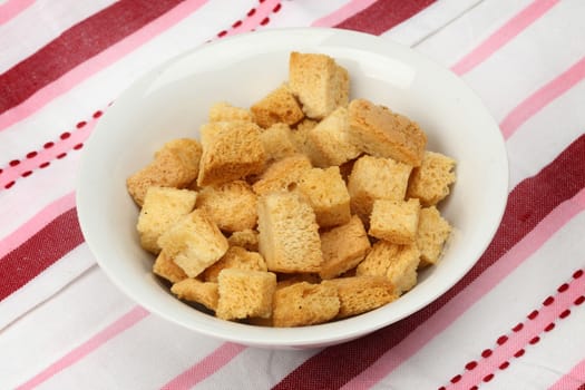  fresh homemade croutons in a bowl.