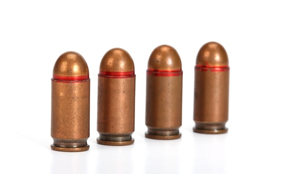 bullets close up over white 