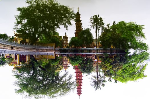 Reflection of Tran Quoc Pagoda, oldest pagoda in Vietnam.