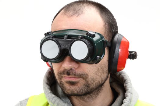 worker with goggles and earphones over white 