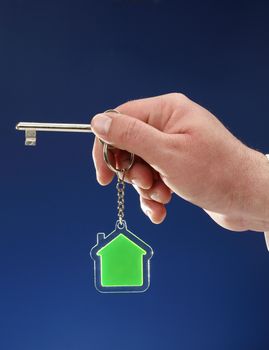 key and transparent key chain in the shape of House