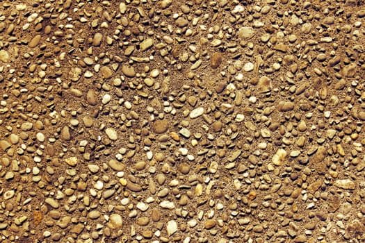 Closeup of textured pebbles background