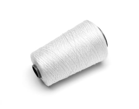 spool white thread on white background