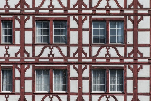 Traditional swiss house wall in red and white.