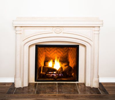 Luxurious White Marble Fireplace Detail and empty white wall