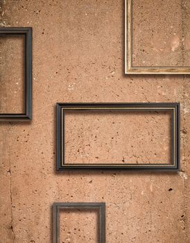 Concrete texture with a lot of details and wooden frames composition
