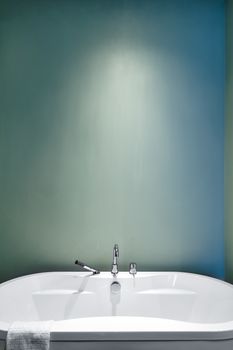 Modern Bathroom with blank wall for your test, image or logo. Soft Green Pastel Colors