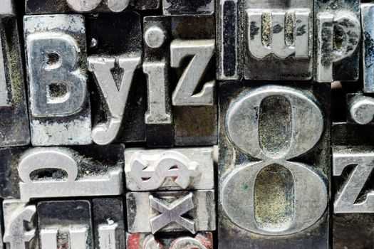 Old metal blank printing press typeset all stacked up