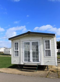 Front of modern caravan on trailer park.